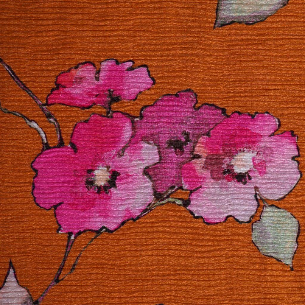 Viskose Plissé Blumen orange pink